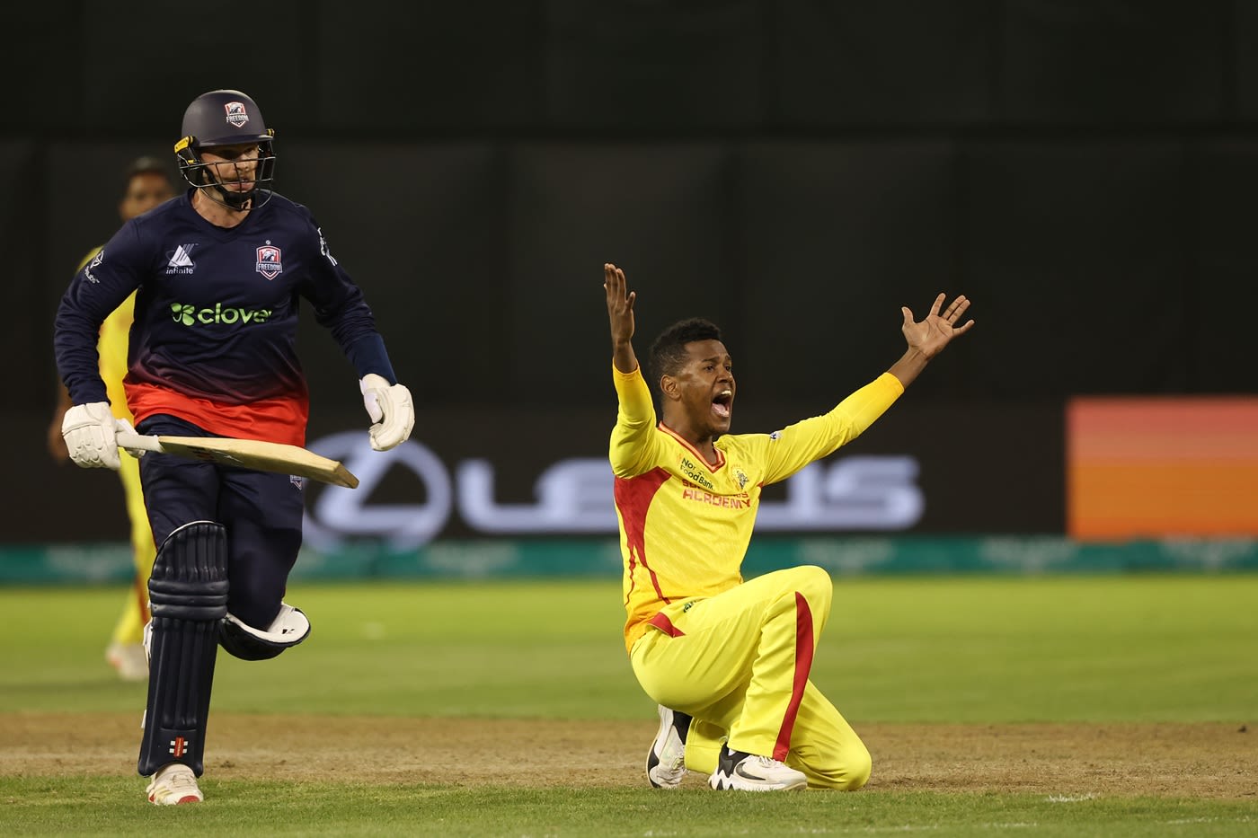 Akeal Hosein appeals unsuccessfully for the wicket of Lockie Ferguson