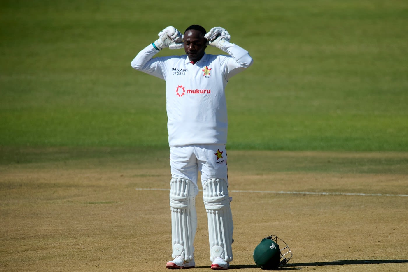 Innocent Kaia celebrates his century