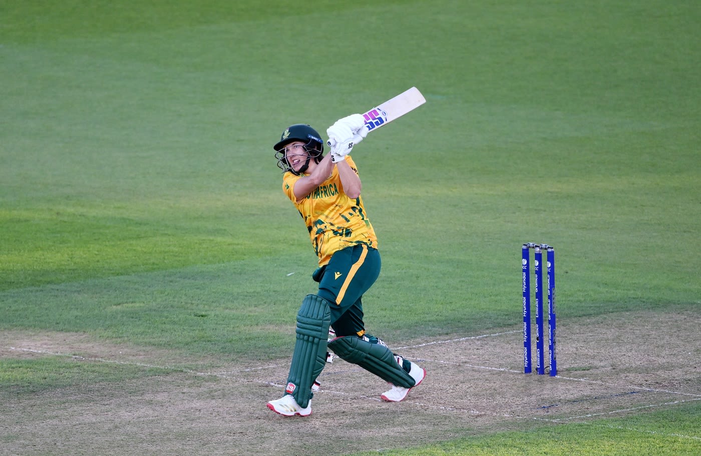 Tazmin Brits goes over mid-on