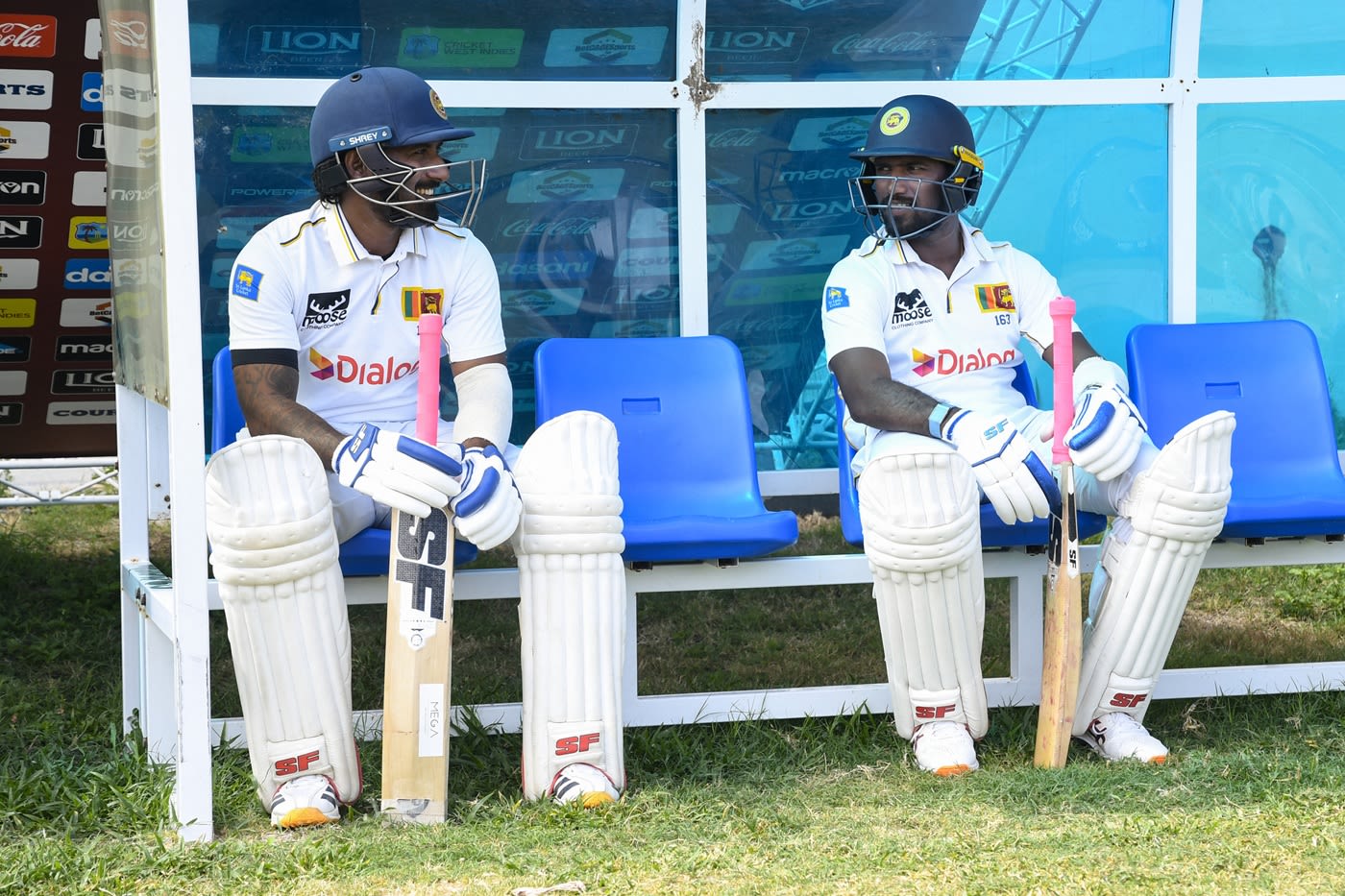 Nishan Madushka and Lahiru Udara relax before walking out to open