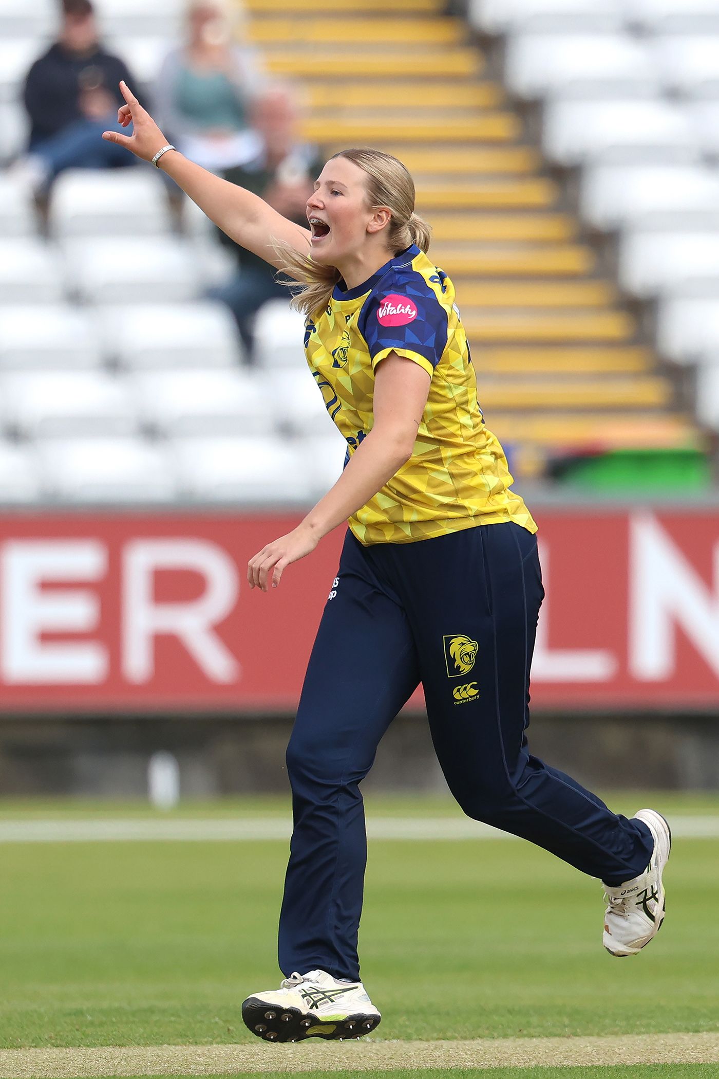 Trudy Johnson celebrates a wicket