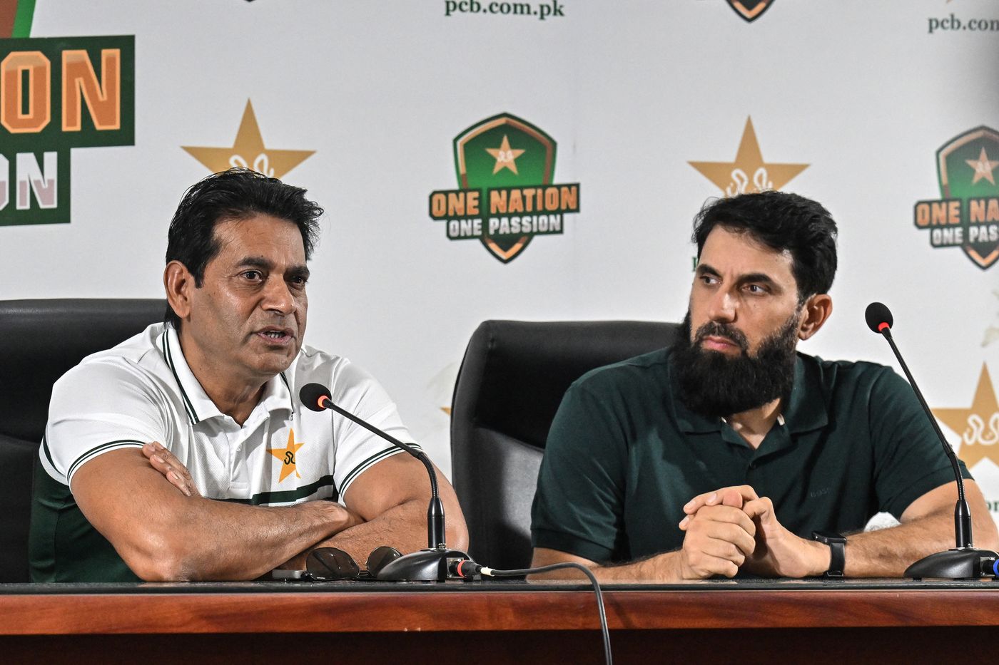 Pakistan national cricket selection committee members Aaqib Javed and Misbah-ul-Haq address a press conference