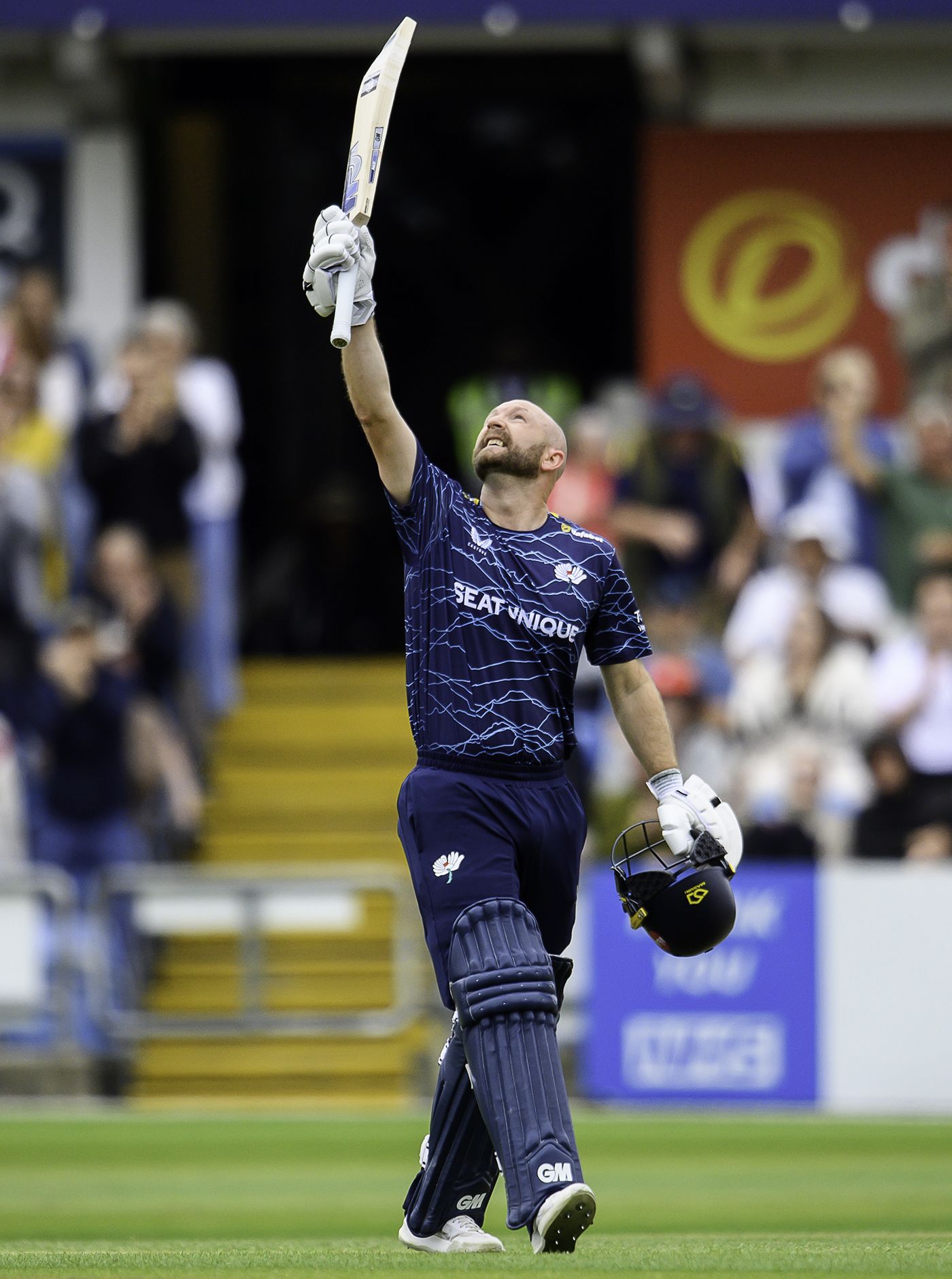 Adam Lyth raises his bat for a hundred