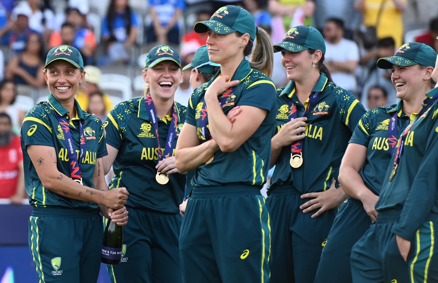 Ashleigh Gardner, Kim Garth, Ellyse Perry, Lucy Hamilton and Georgia Voll wait to receive the trophy
