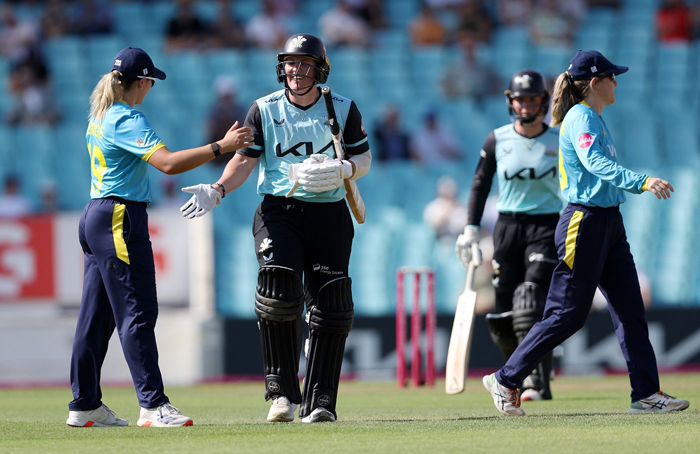 Laura Harris is congratulated after her innings of 81 off 32 balls