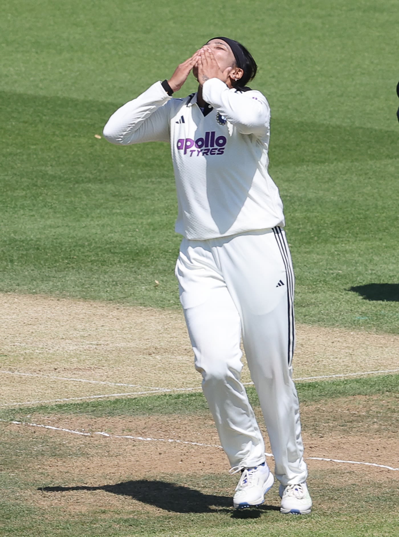 Sneh Rana reacts to the wicket of Amy Jones