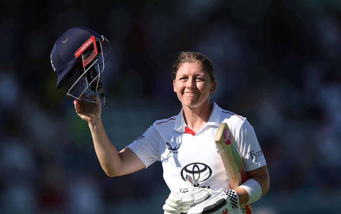 Heather Knight leaves the field for the final time in an England shirt