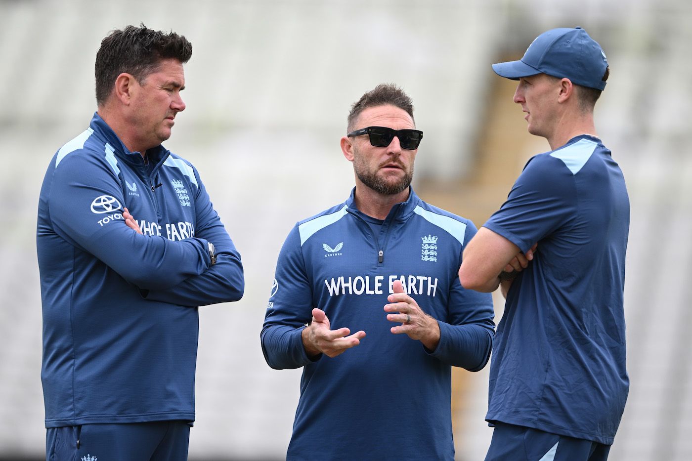 Marcus North, Brendon McCullum, and Harry Brook have a chat
