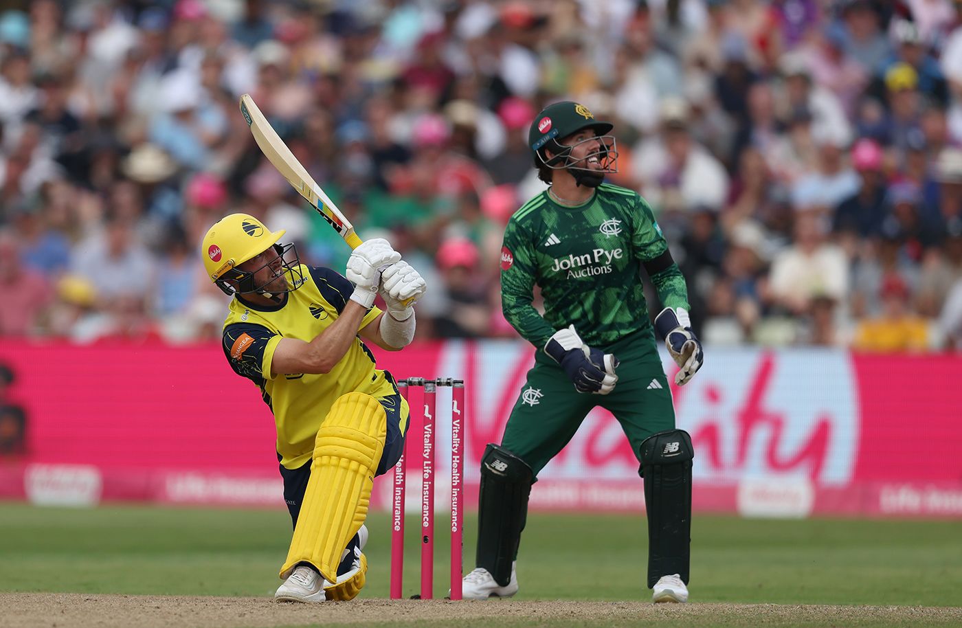 Joe Weatherley slog-sweeps on his way to 50