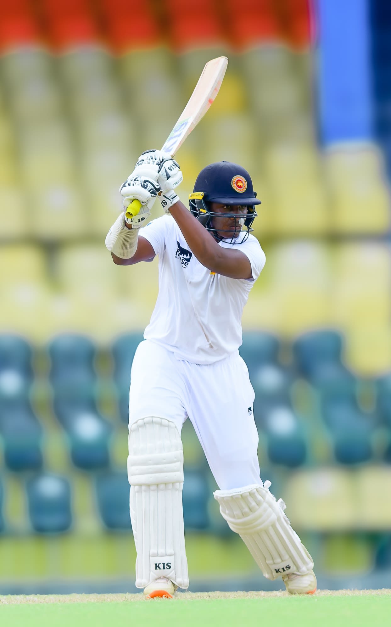 Senuja Wekunagoda drives towards the covers