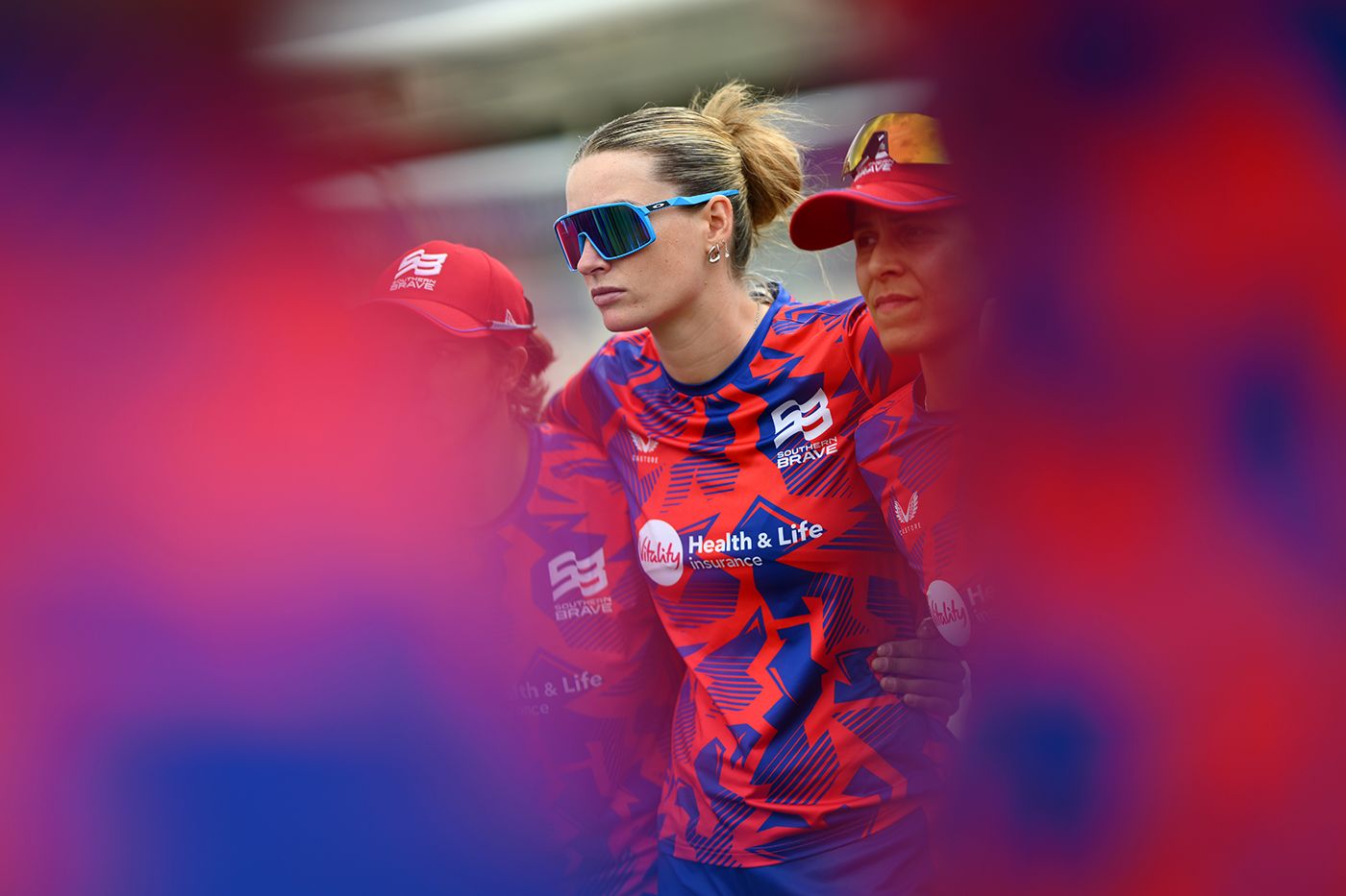 Lauren Bell watches on in the Southern Brave huddle