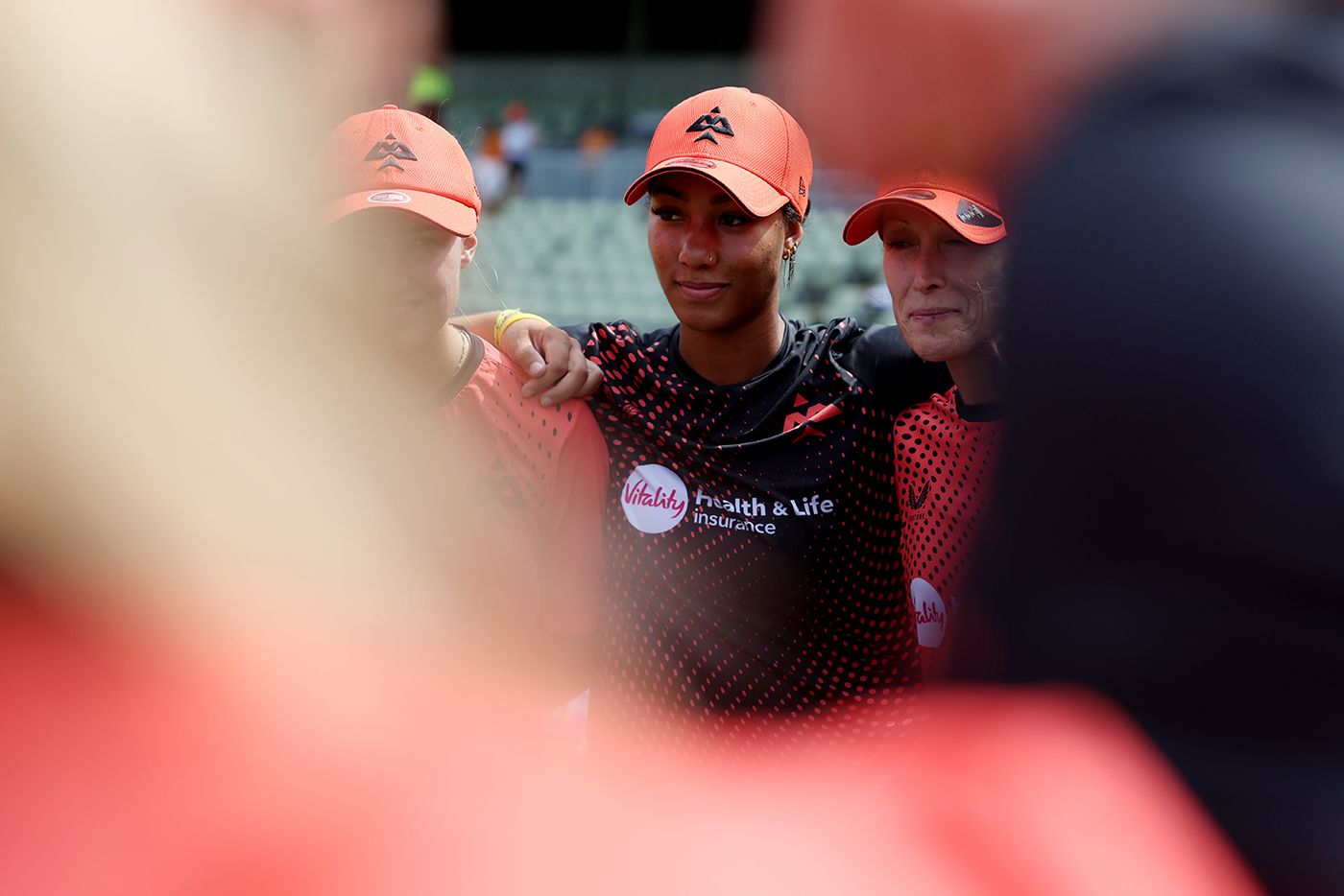 Davina Perrin looks on in the Birmingham Phoenix huddle