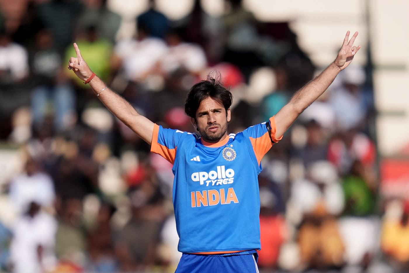 Ravi Bishnoi celebrates Dion Myers' wicket