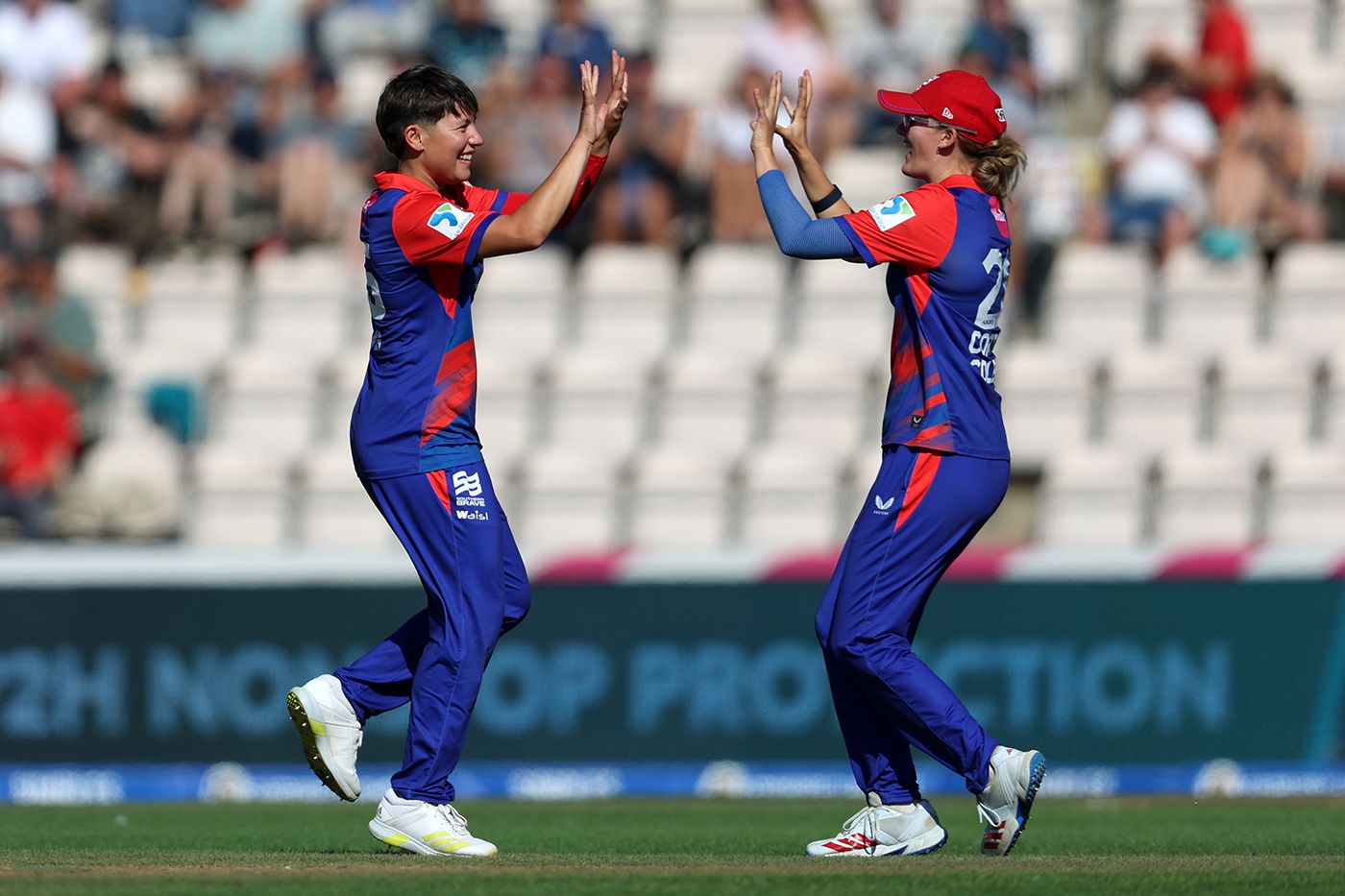 Issy Wong celebrates with Tilly Corteen-Coleman