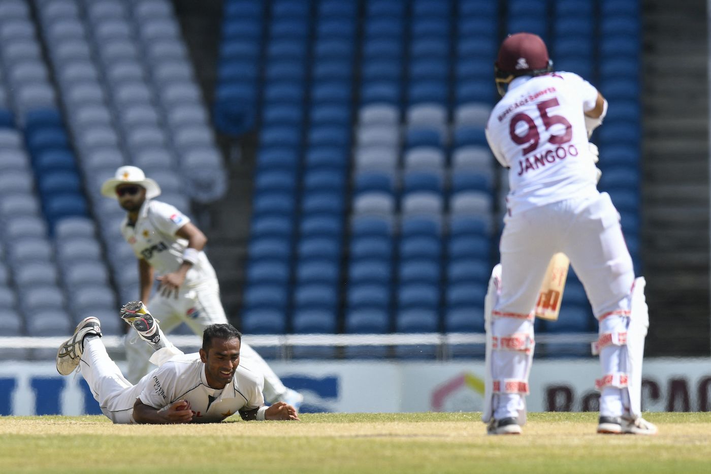 Mohammad Ali took a low return catch to dismiss Amir Jangoo