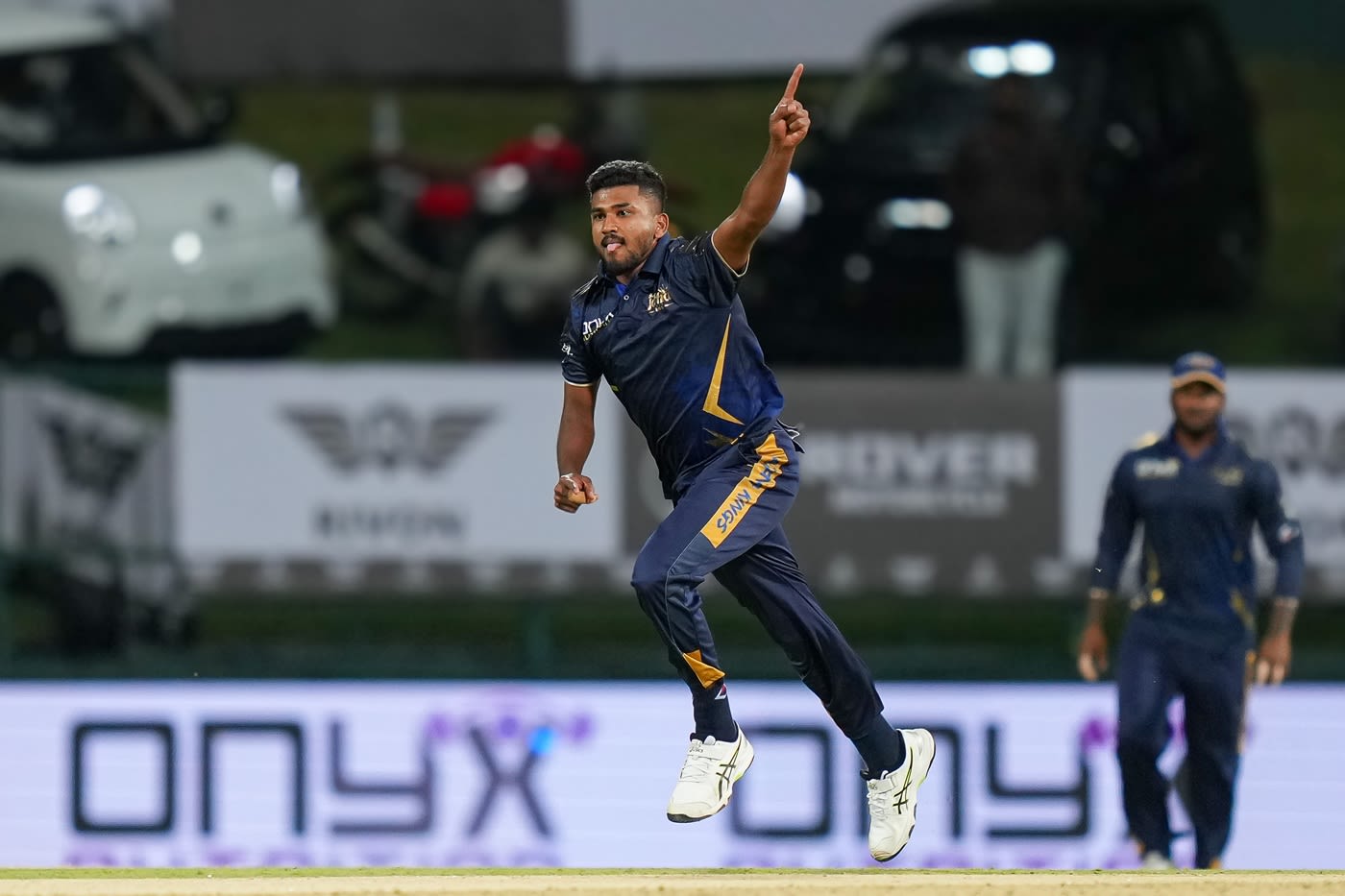 Dilshan Madushanka wheels away after taking a wicket