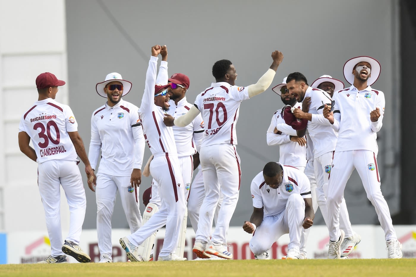 The West Indies players begin the celebrations