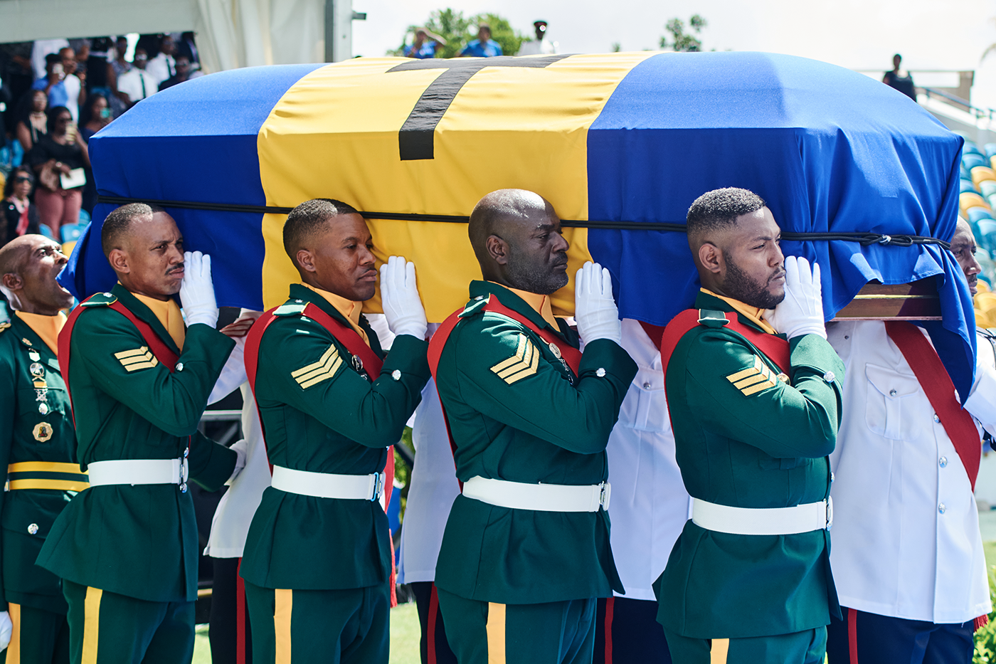 Members of the honour guard carry the coffin of Garry Sobers during his funeral at the Kensington Oval