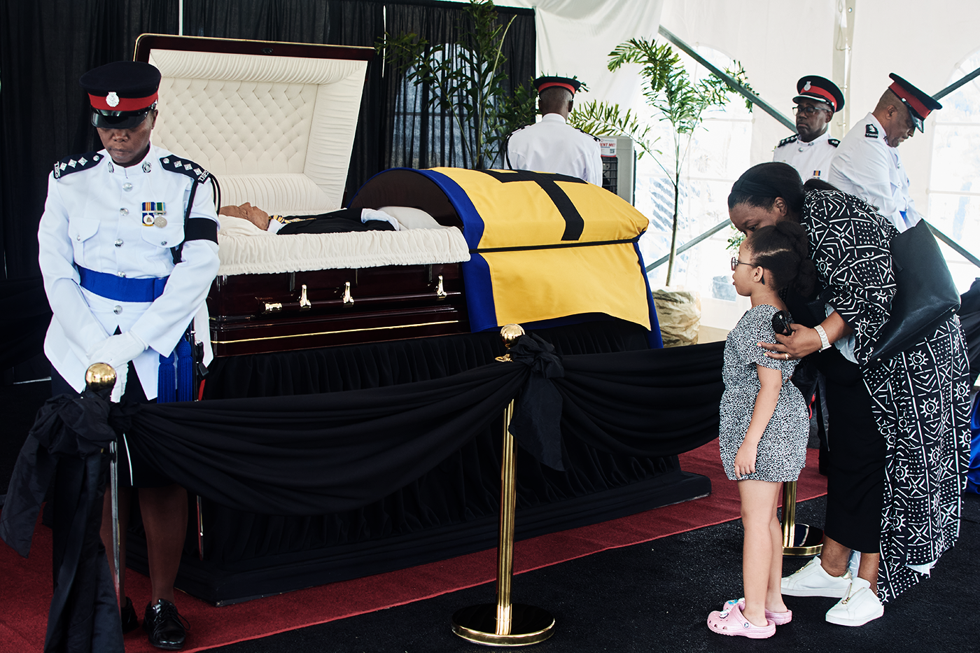 People pay their final respects to Garry Sobers during his funeral at the Kensington Oval