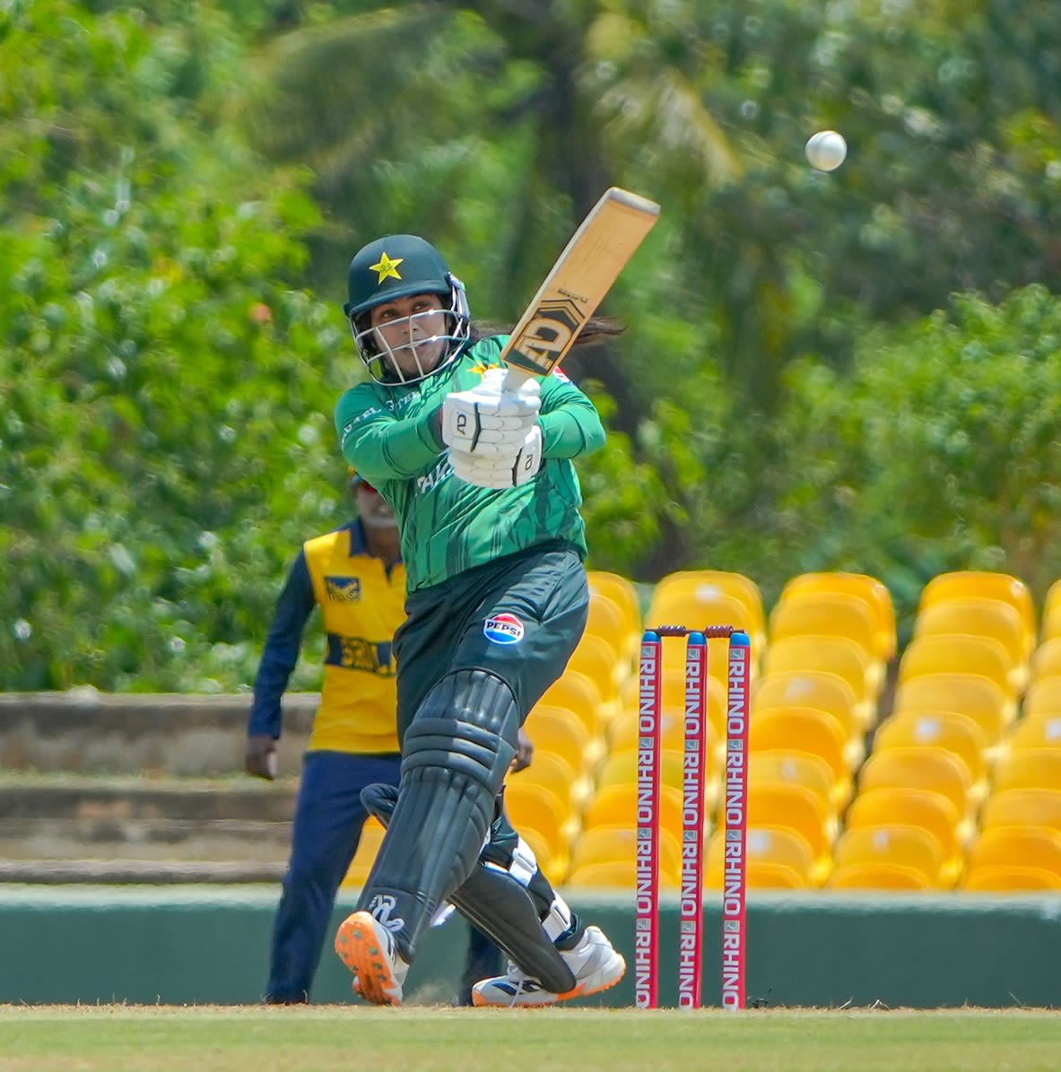 Ayesha Zafar goes over the on side