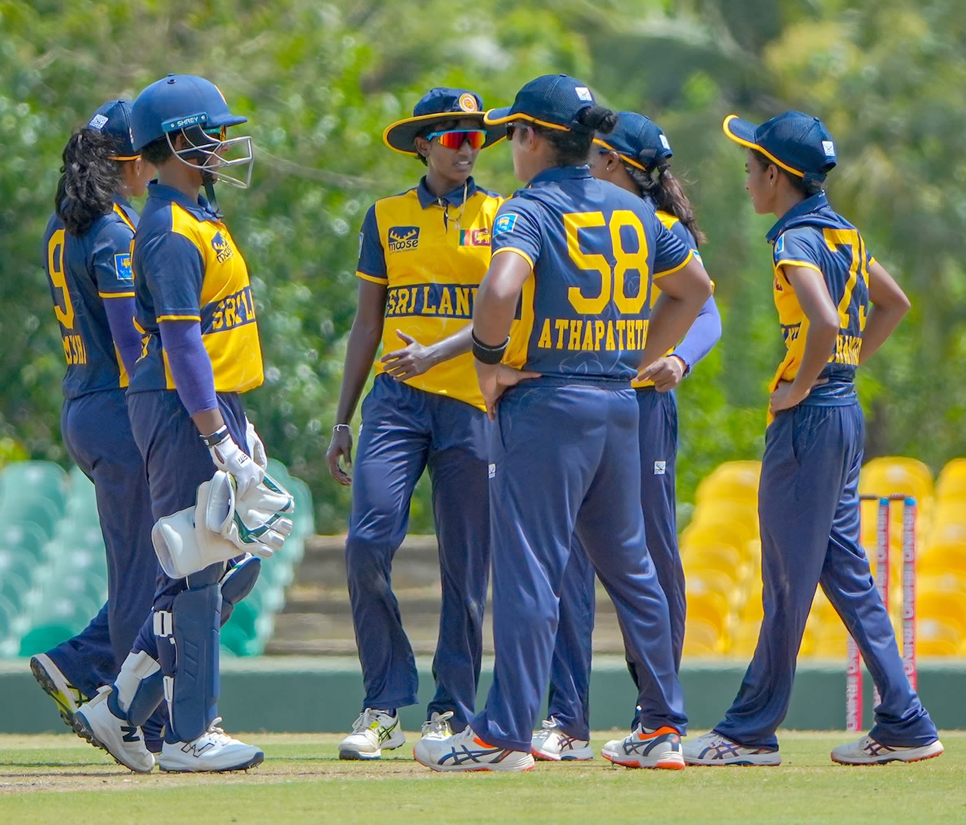The Sri Lanka players celebrate a wicket