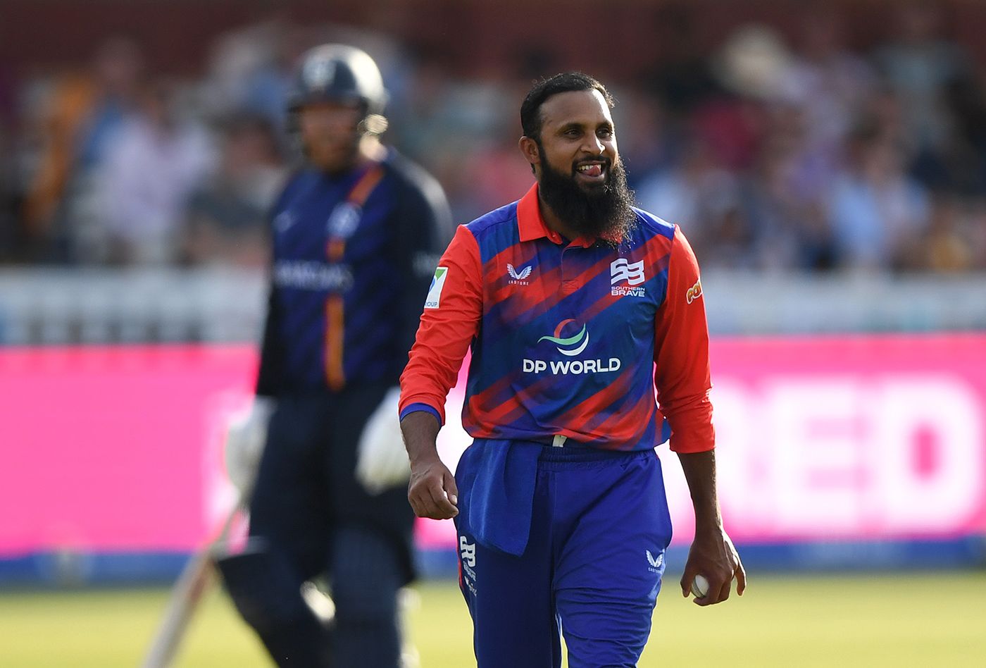 Adil Rashid licks his lips