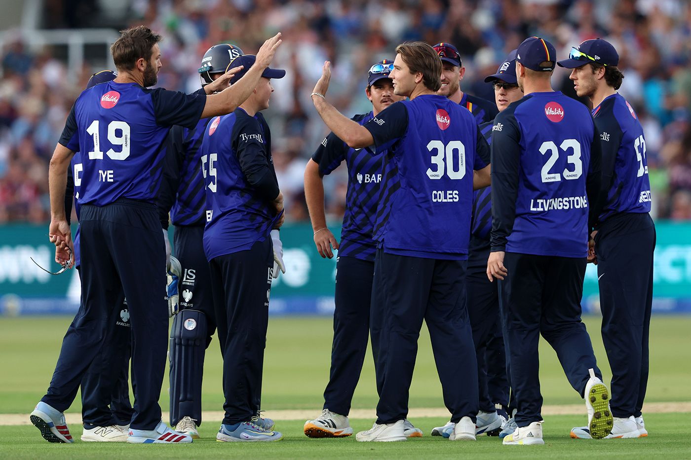 James Coles celebrates with his team-mates