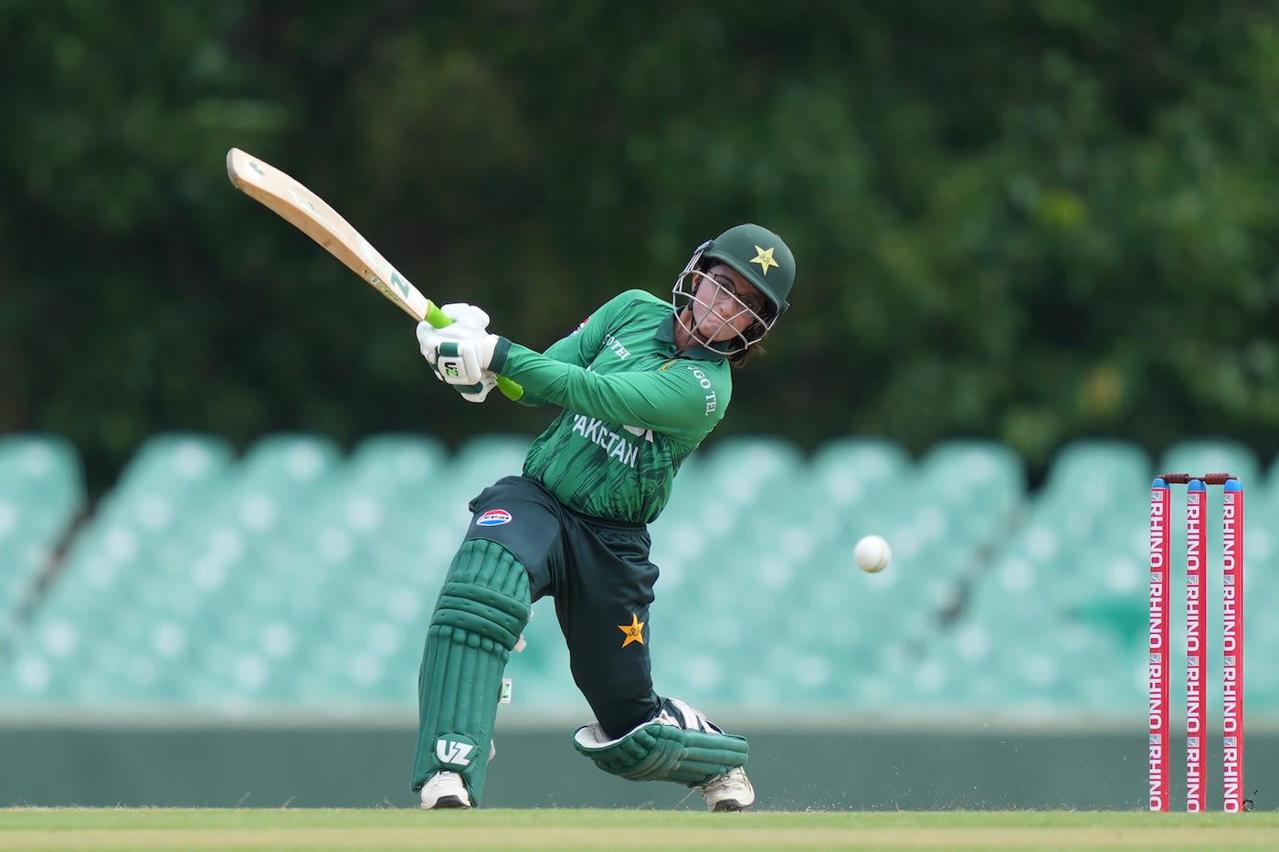 Muneeba Ali muscles the ball away