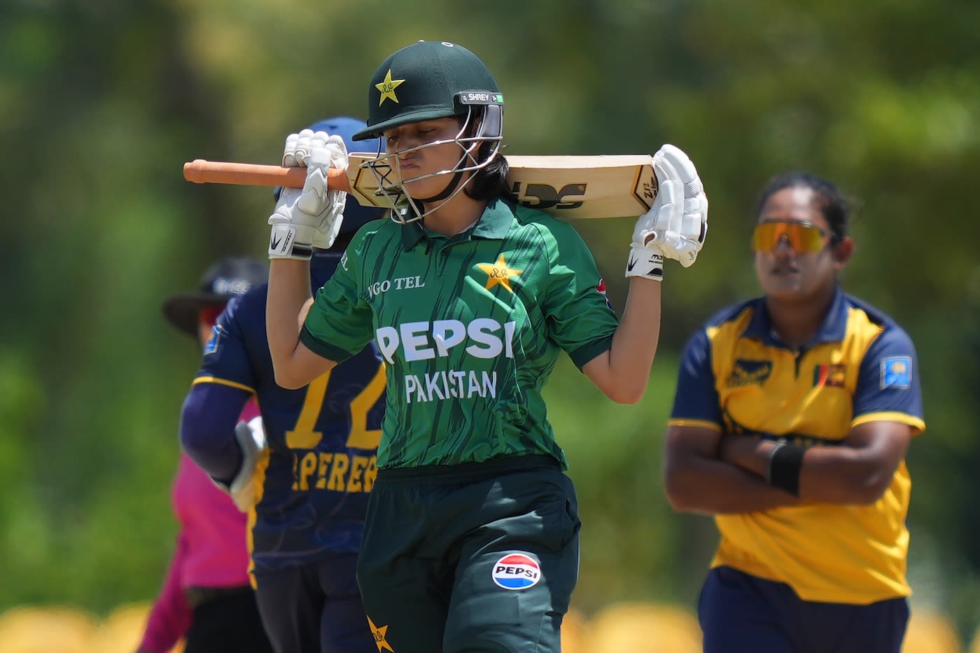 Saira Jabeen looks dejected as she walks off