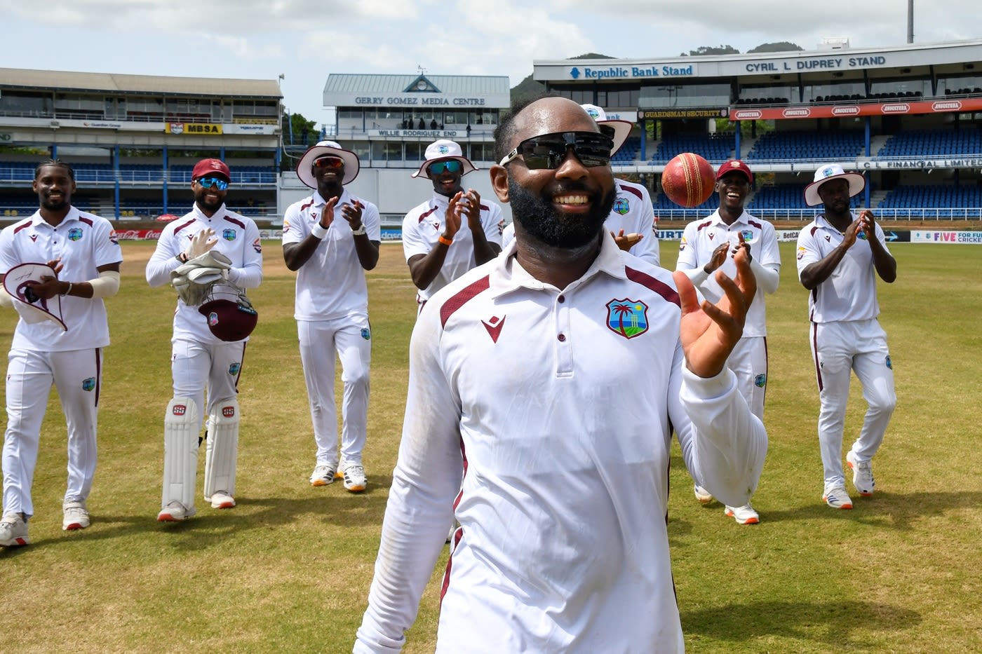 Jomel Warrican leads the team off after picking up a six-for