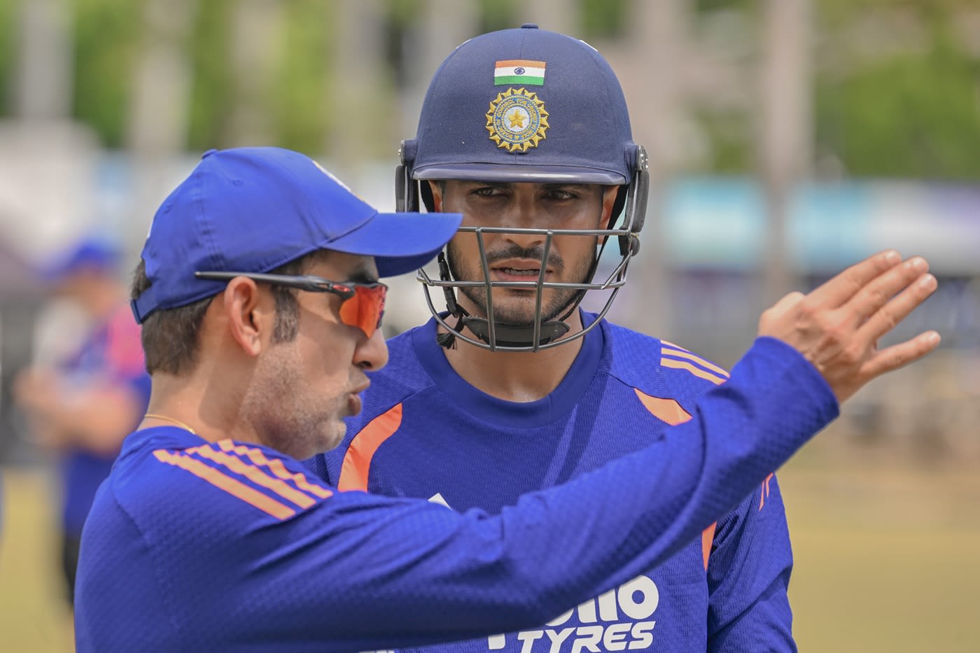 Shubman Gill listens as his coach Gautam Gambhir does the talking