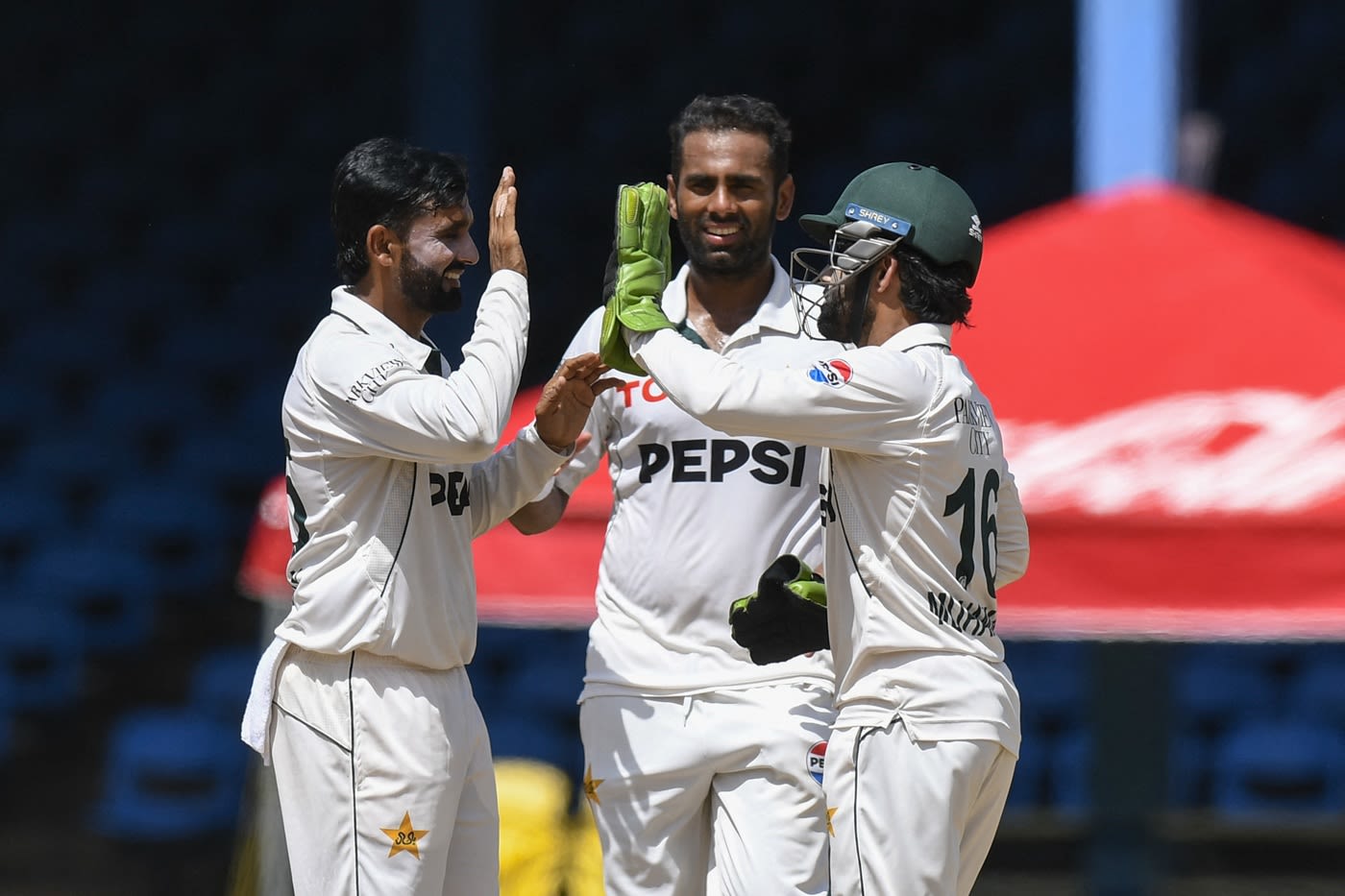 Mohammad Ali, Ali Usman and Mohammad Rizwan celebrate a wicket
