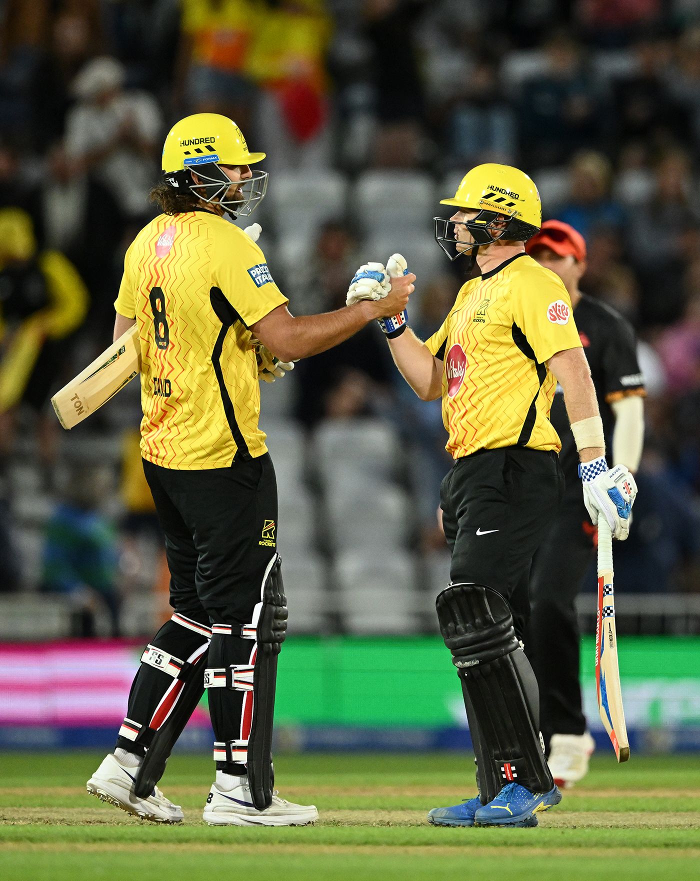 Sam Billings and Tim David celebrate the win