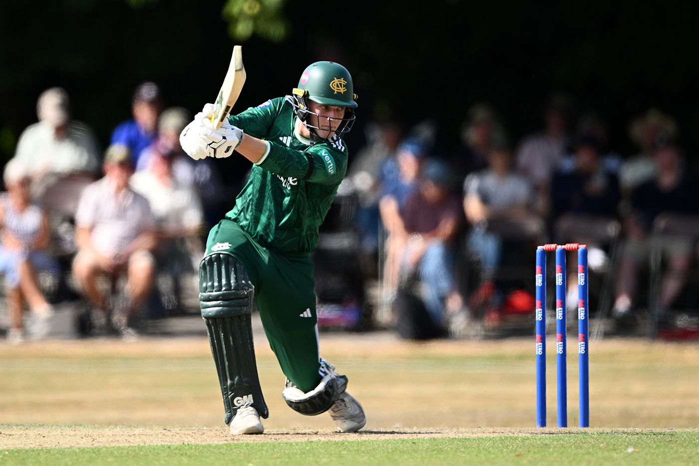 Freddie McCann drives during his innings of 91