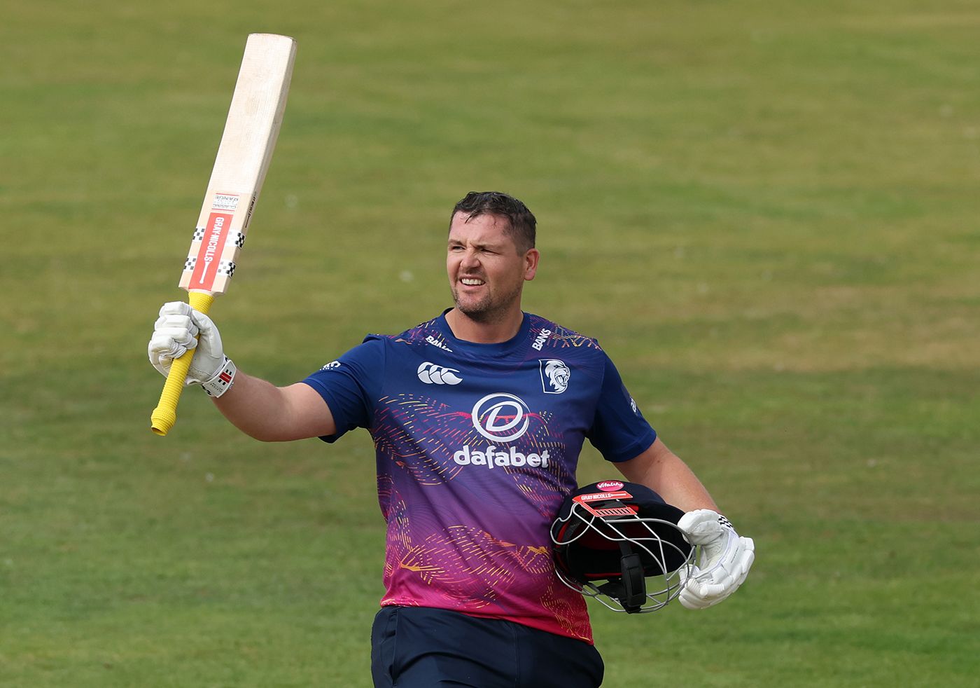 Alex Lees celebrates after notching a hundred