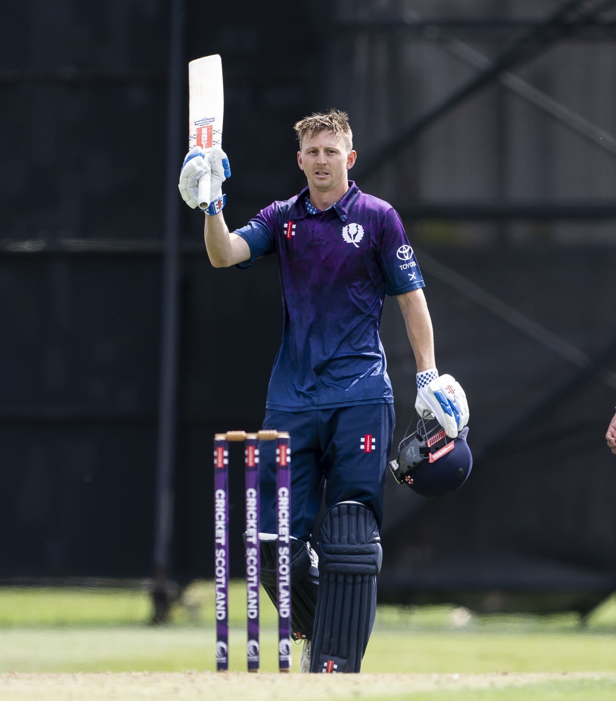Finlay McCreath celebrates his century