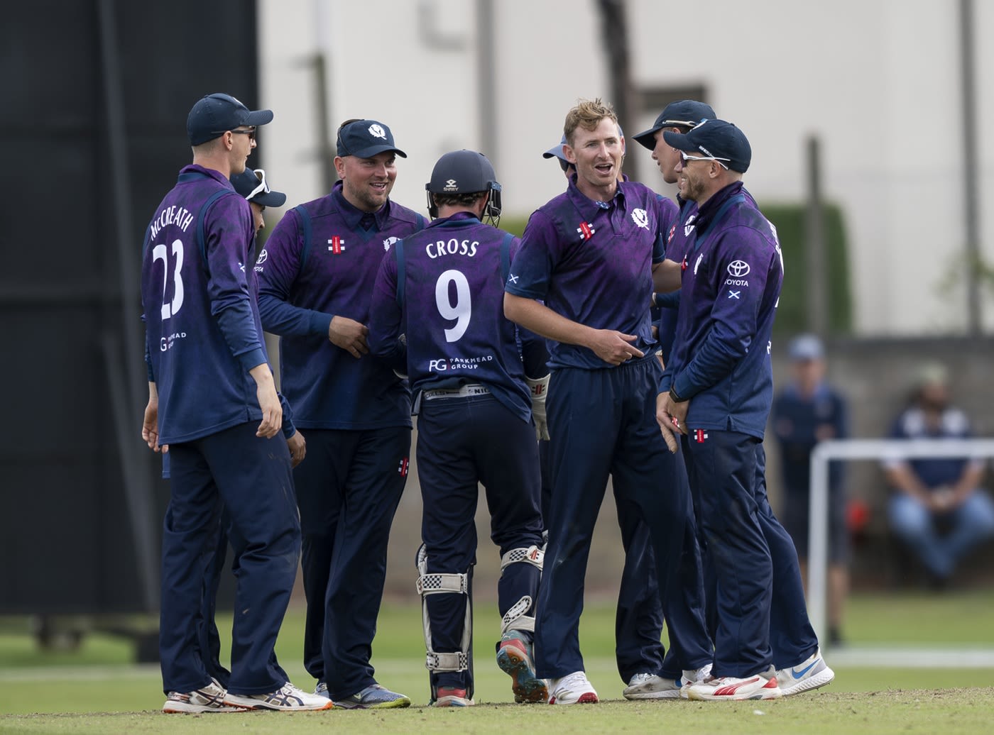 Brandon McMullen celebrates with his team-mates