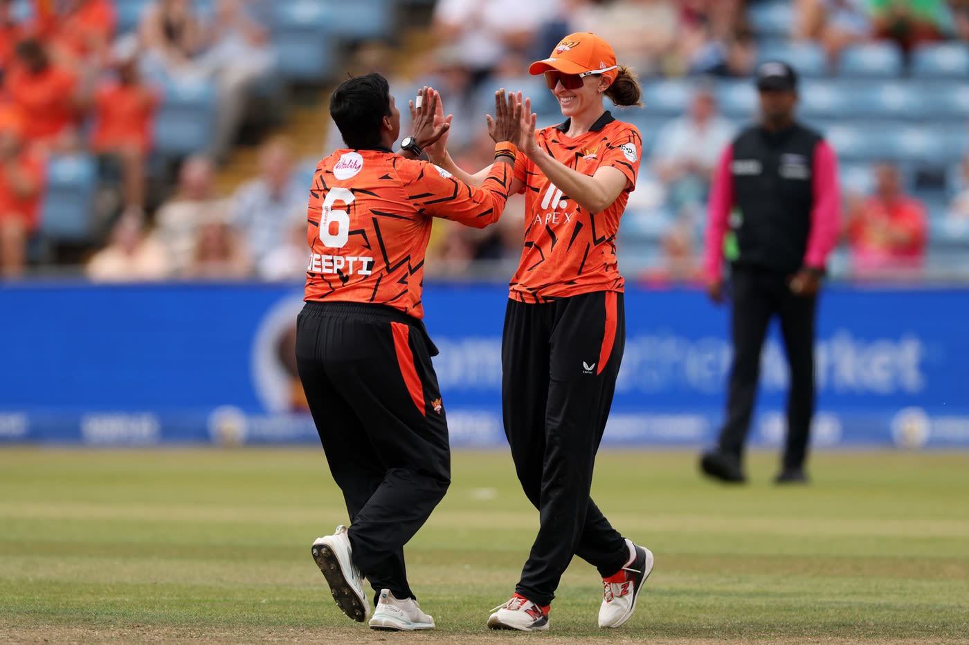 Deepti Sharma and Kate Cross celebrate a wicket