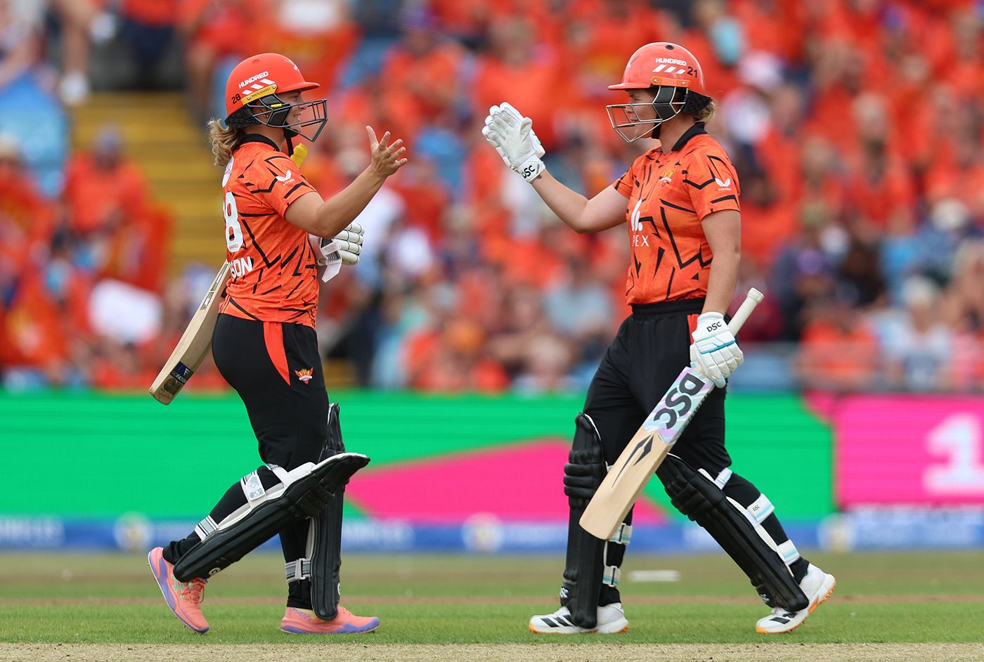 Dani Gibson and Jess Jonassen celebrating getting the job done