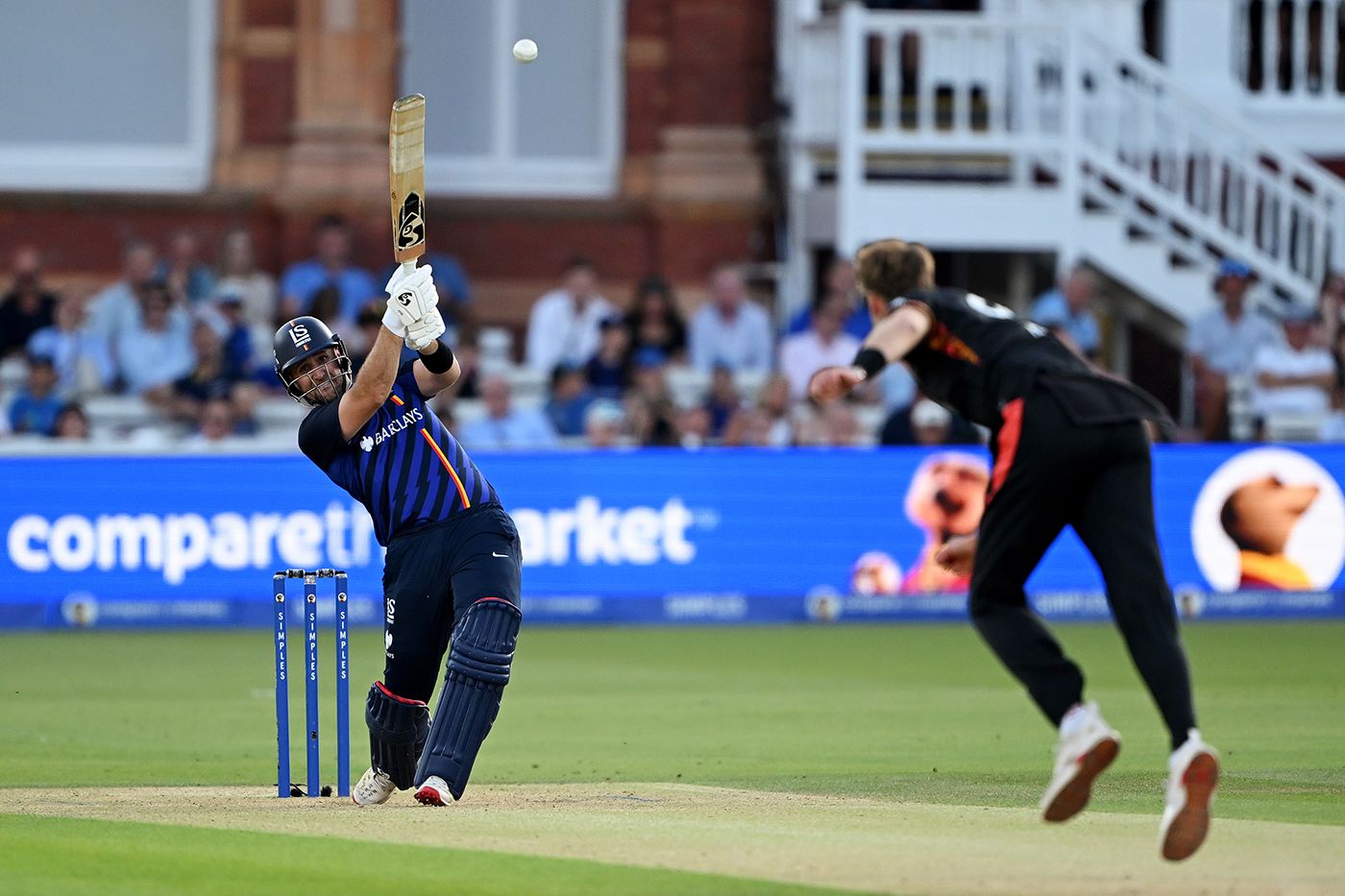 Liam Livingstone hits one back over Tom Helm's head