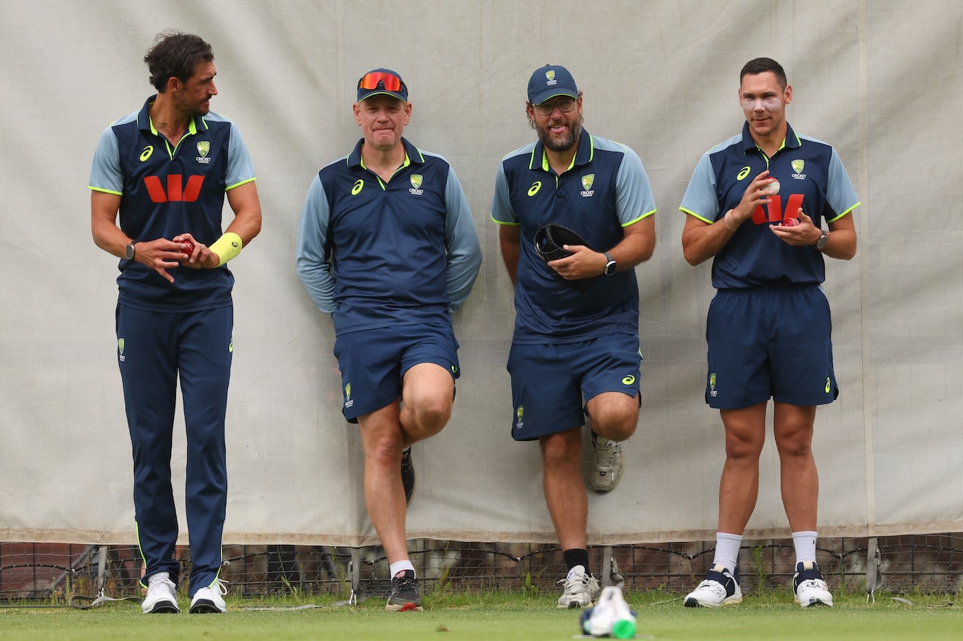 Andrew McDonald and Daniel Vettori chat with Mitchell Starc and Scott Boland in the nets