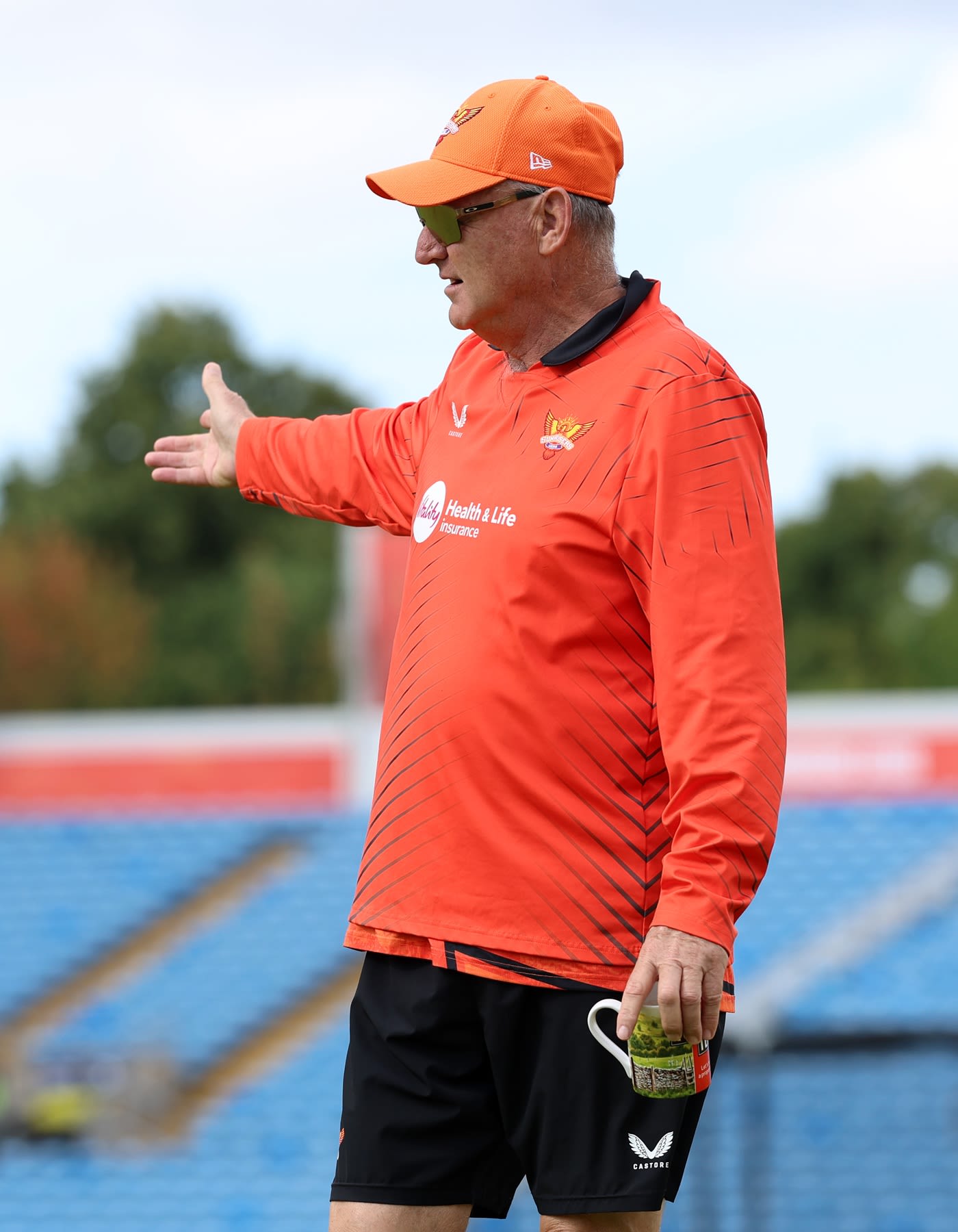 Head coach Adrian Birrell oversees proceedings
