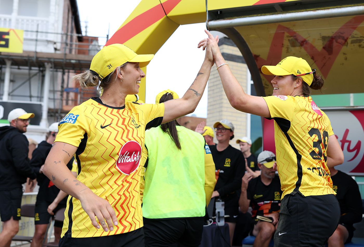 Ash Gardner celebrates with Nat Sciver-Brunt