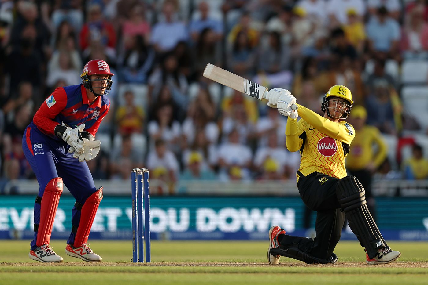 Mitchell Santner gets down to slog-sweep