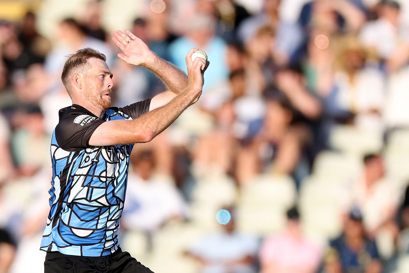 Tom Taylor bowls for Worcestershire