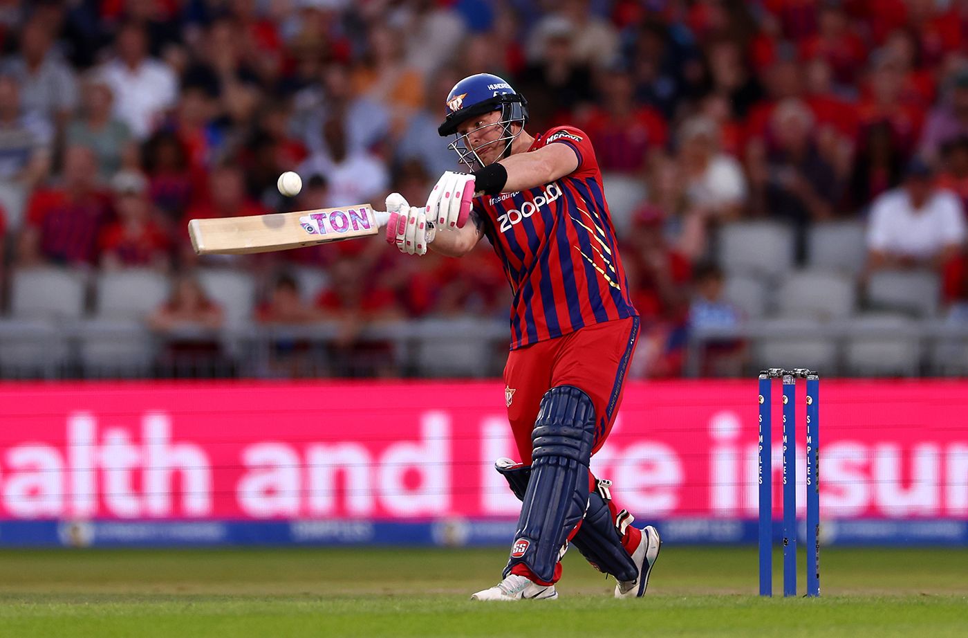 Tim Seifert cracks a pull into the leg side