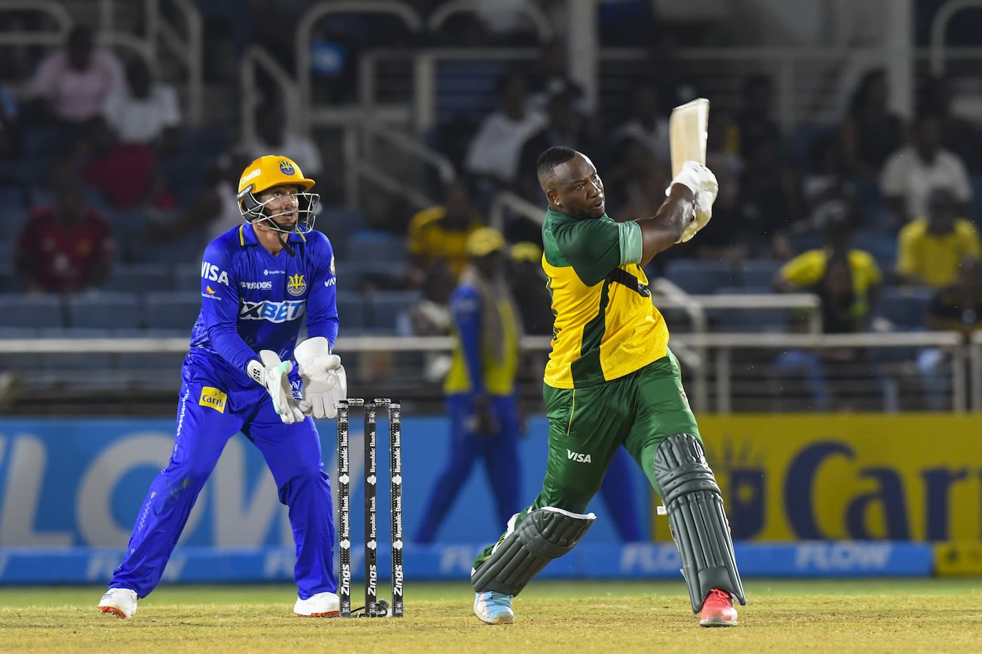 Andre Russell gives the ball a thump