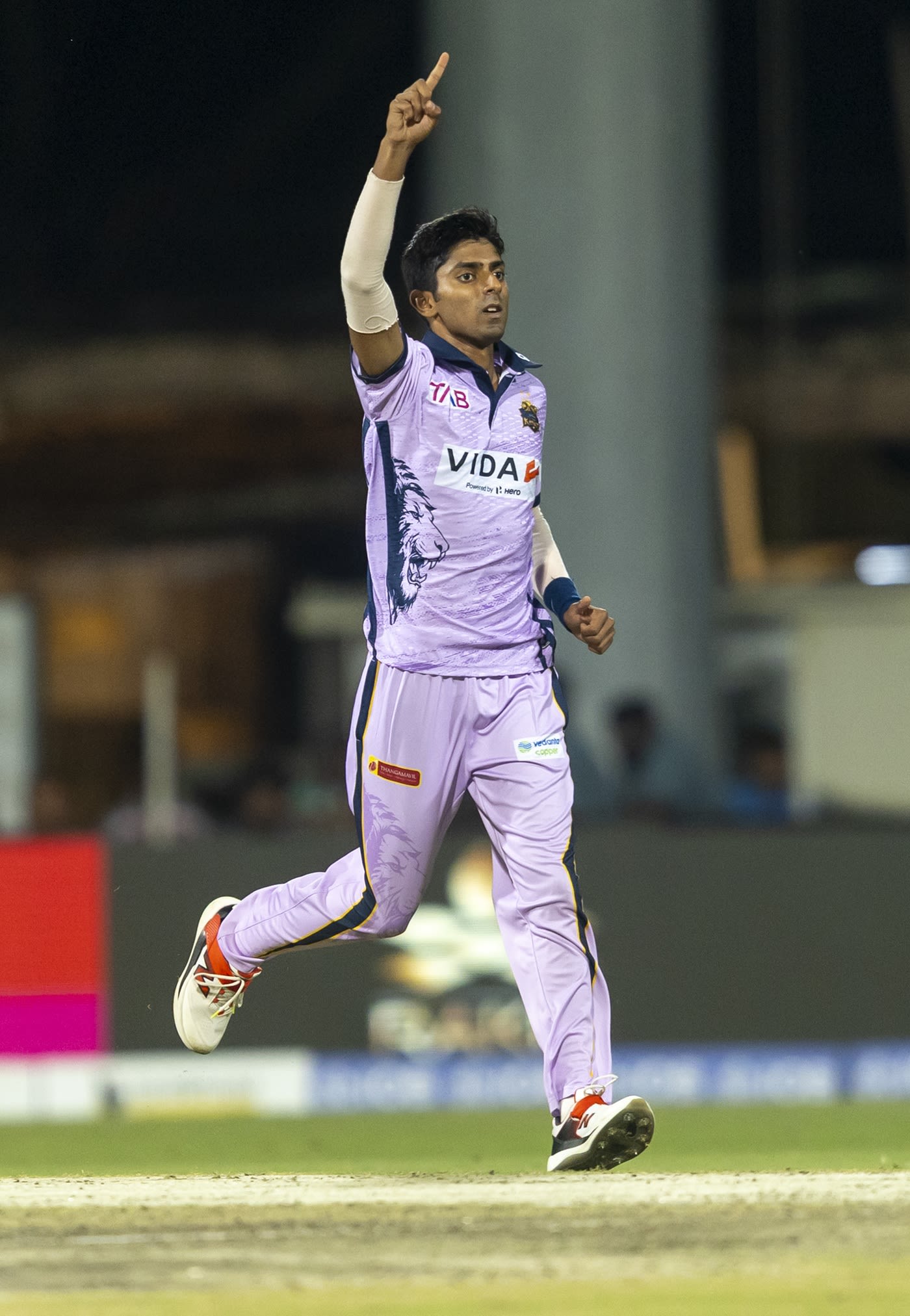 Jhathavedh Subramanyan wheels away after taking a wicket