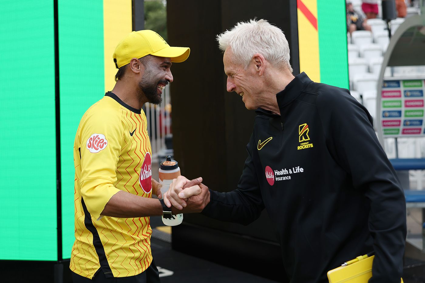Mohammad Amir and Peter Moores celebrate
