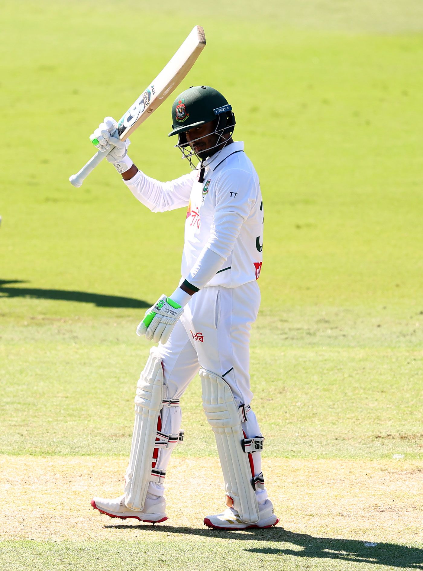 Tanzid Hasan raises the bat for his fifty